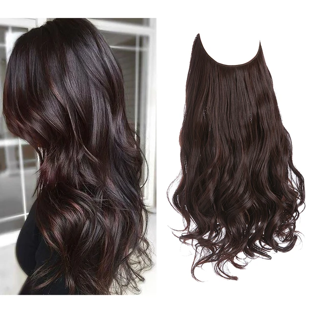 Extension capillaire monobloc pour femme offrant un volume généreux ; modèle en forme de U avec fil invisible, pour une chevelure longue, bouclée et naturelle.