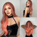 Perruque longue et bouclée de 61 cm (24 pouces) pour femme, raie au milieu, orange et rose.