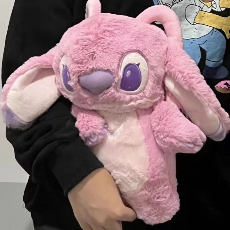 11.64/23.29 USD - Animated celebrity-inspired plush hot water bottle