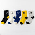 17.46 USD Chaussettes enfant automne-hiver en coton mi-hautes, motif visages souriants, pour enfants de 1 à 15 ans.