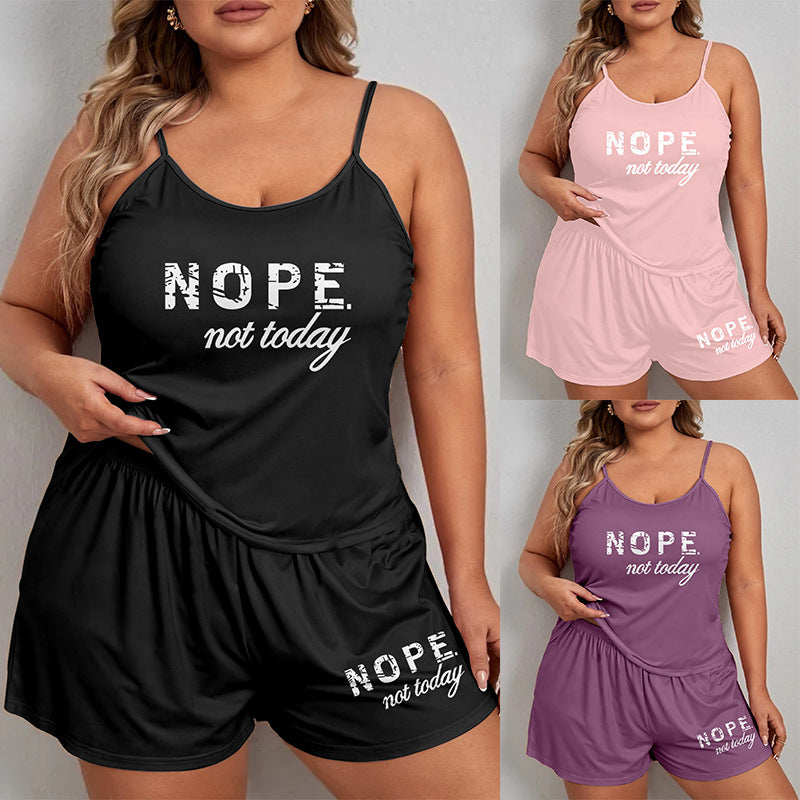 Ensemble de pyjama confortable pour femme avec imprimé lettres, short à bretelles oversize, idéal pour être porté à l'extérieur.