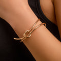 $7.22 USD - Double-row bracelet with hollow knot opening, trendy handmade accessory, ideal for women's daily wear.