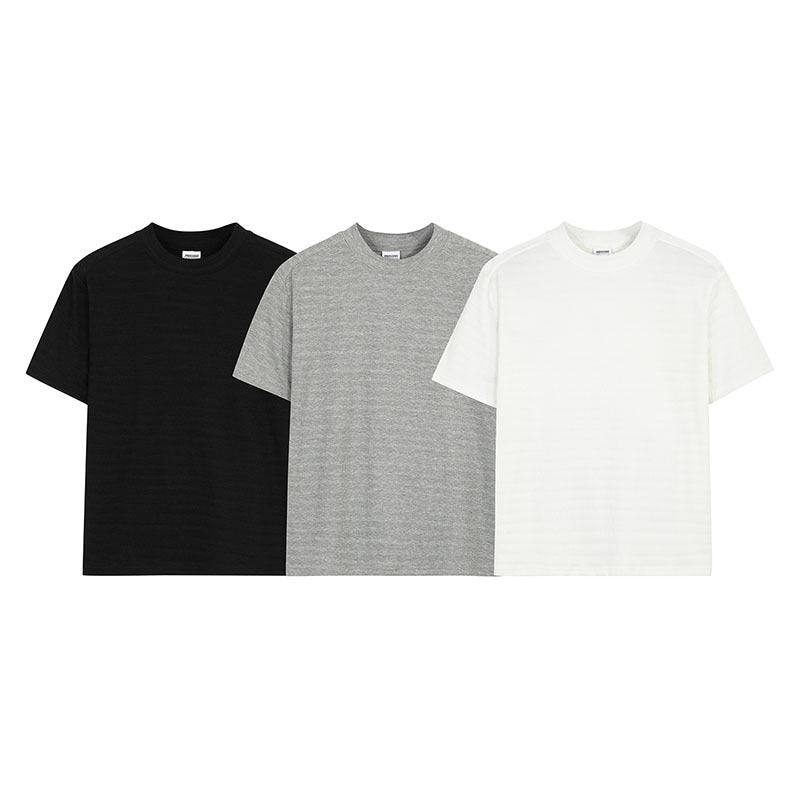 23,29 USD - T-shirt à manches courtes unisexe, tendance et simple, coupe courte et épaules classiques.