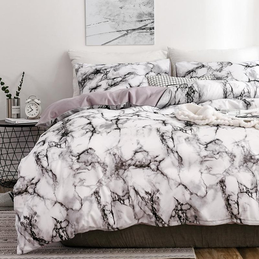 15.13/41.91 USD  La parure de lit est composée d'une housse de couette imprimée à motif marbre blanc confortable (ensemble 2/3 pièces).