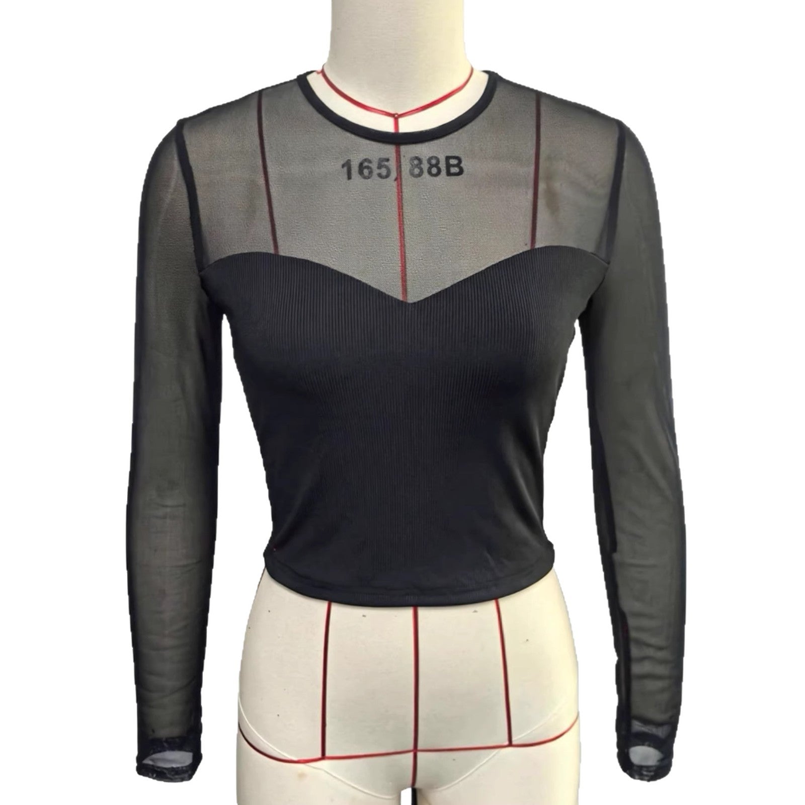 Chic long-sleeved crop top for women with mesh inserts, ideal for spring and summer. A versatile, sexy, and casual crop top for girls.