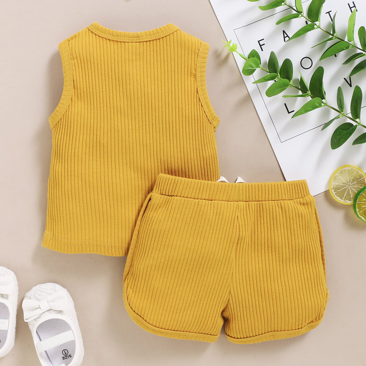 15.13 USD Ensemble de vêtements pour bébés garçons et filles, débardeur sans manches à boutons et short assortis.