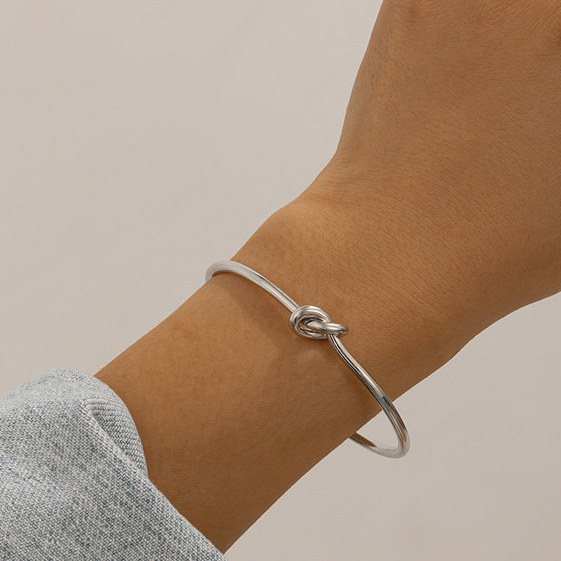 $7.22 USD - Double-row bracelet with hollow knot opening, trendy handmade accessory, ideal for women's daily wear.