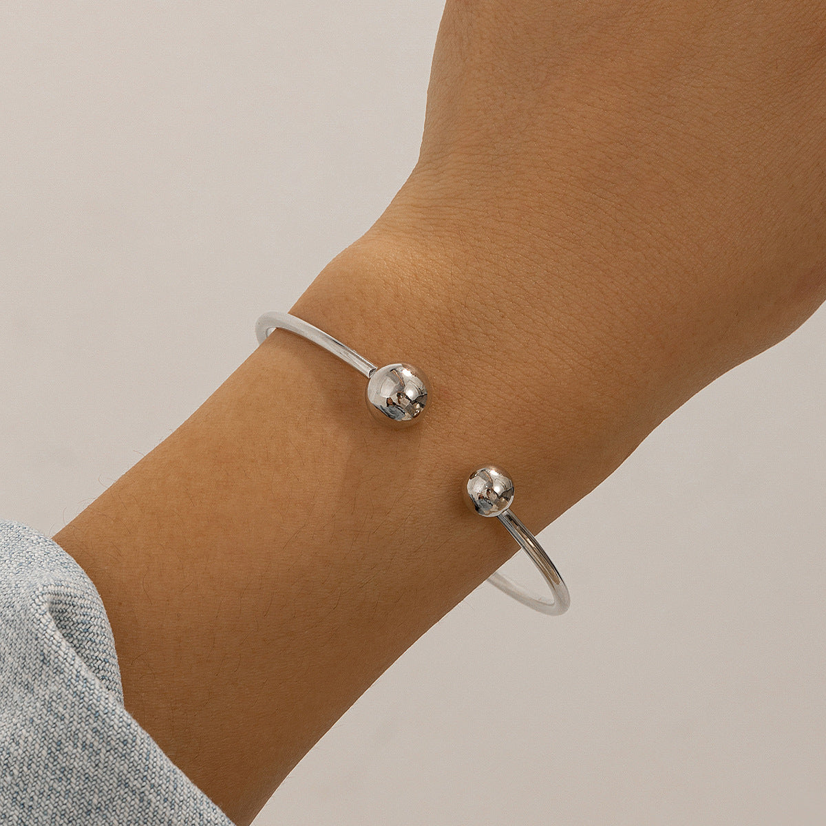 $7.22 USD - Double-row bracelet with hollow knot opening, trendy handmade accessory, ideal for women's daily wear.