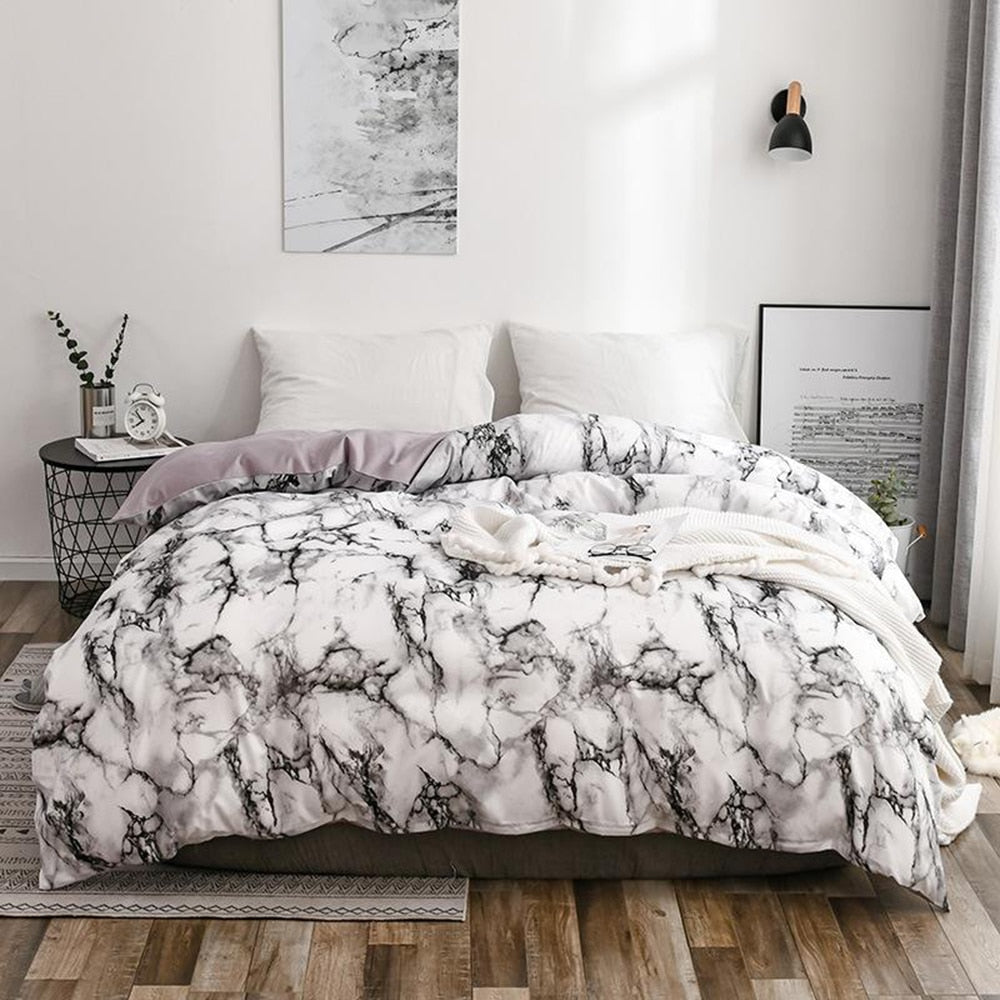 15.13/41.91 USD  La parure de lit est composée d'une housse de couette imprimée à motif marbre blanc confortable (ensemble 2/3 pièces).