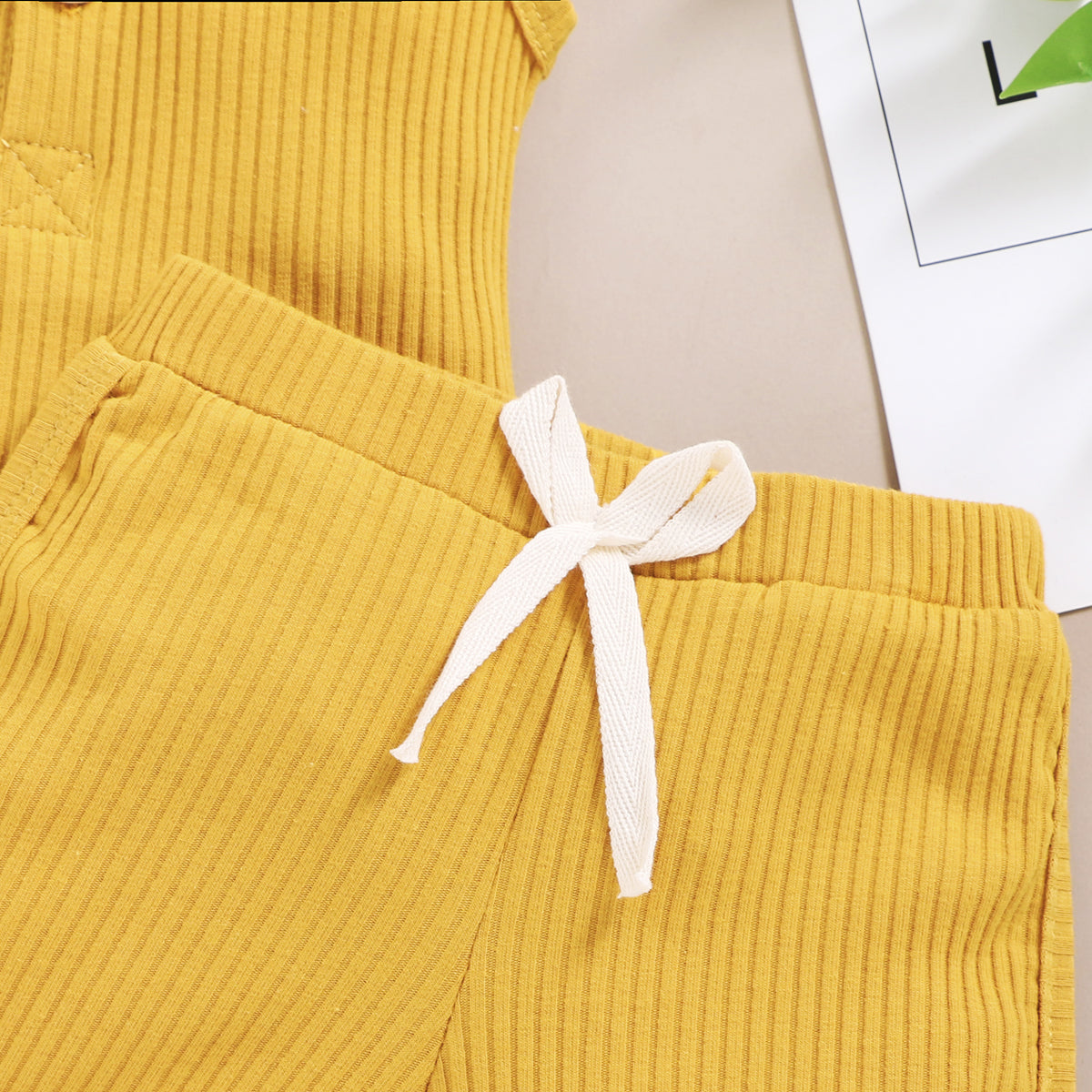15.13 USD Ensemble de vêtements pour bébés garçons et filles, débardeur sans manches à boutons et short assortis.