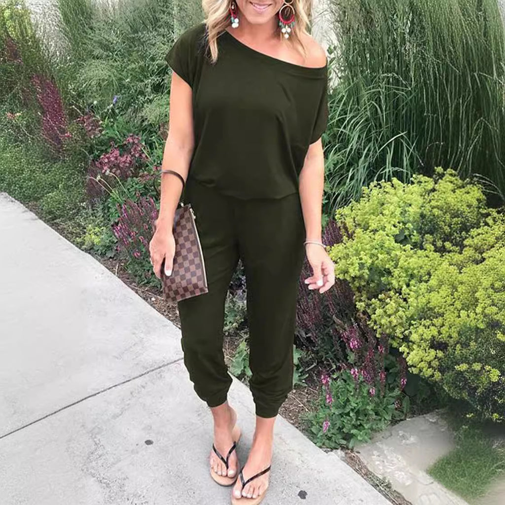 Combinaison femme tendance à épaules asymétriques, manches courtes et poches, disponible en 6 couleurs