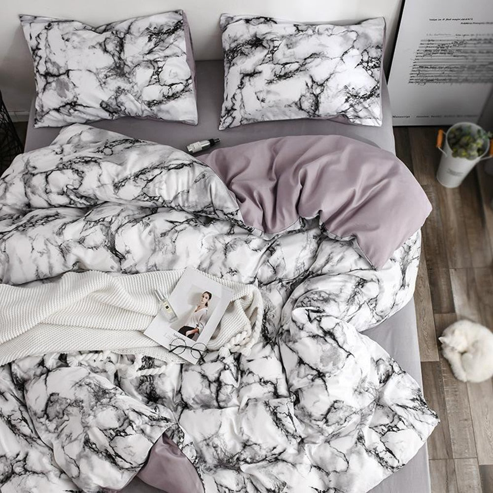 15.13/41.91 USD  La parure de lit est composée d'une housse de couette imprimée à motif marbre blanc confortable (ensemble 2/3 pièces).