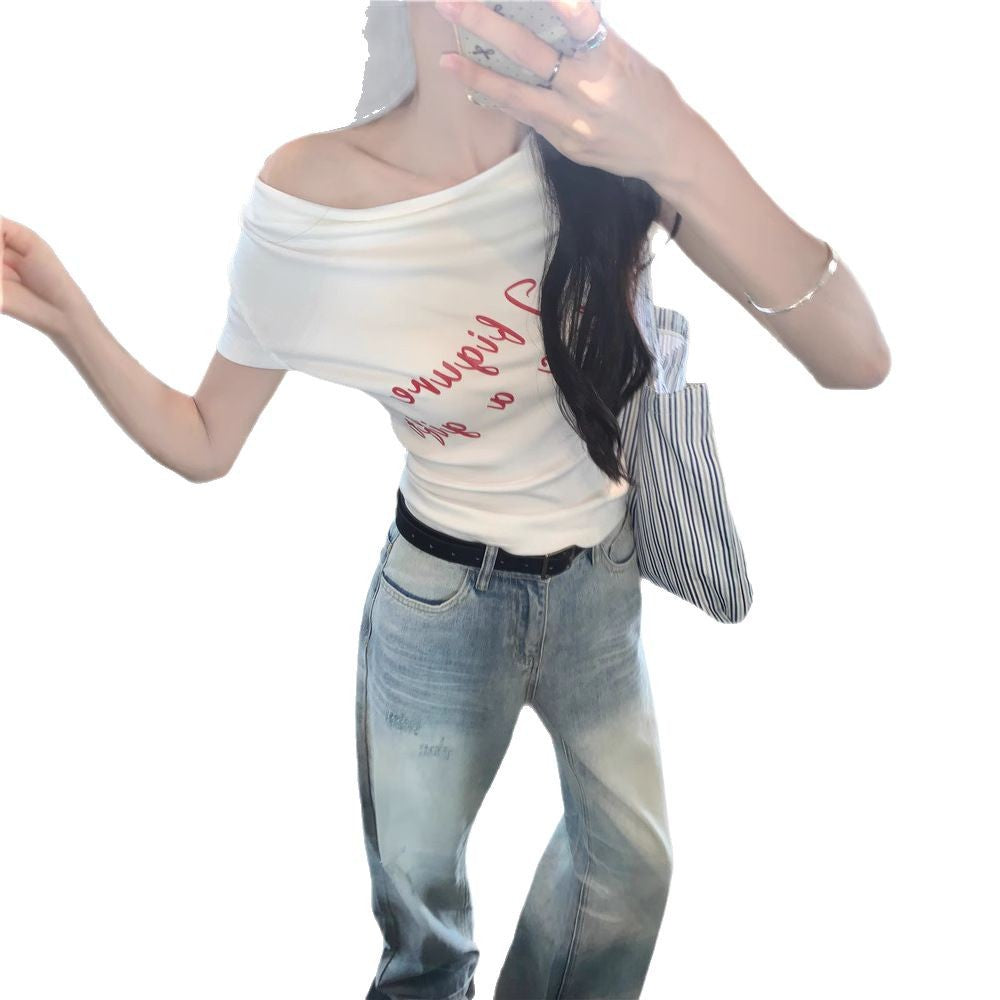 16.30 USD T-shirt court à une épaule et manches courtes, coupe ajustée, imprimé lettres, crop top, blouse décontractée à épaules dénudées