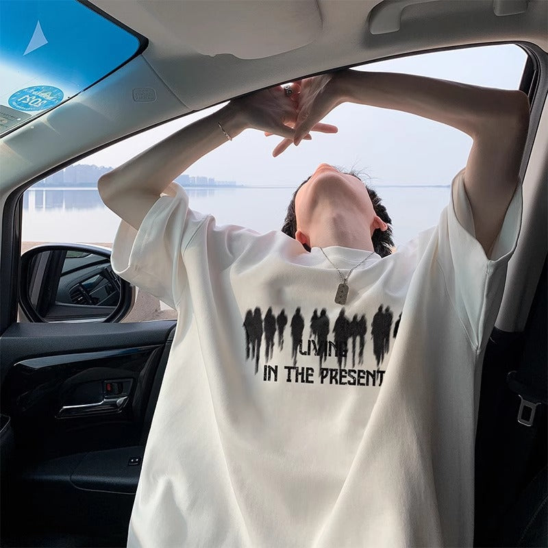 Loose-fit mid-length sleeve T-shirt