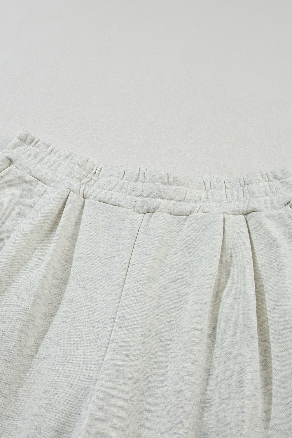 Two-piece set consisting of a black crop top and wide-leg trousers
